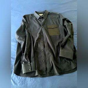 Has some shine to pockets. Calvin K dress shirt